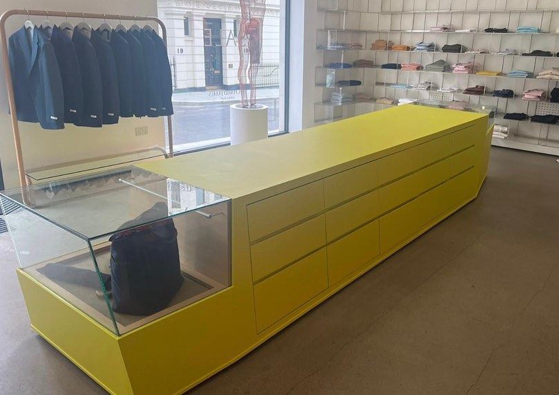 Retail counter after wrapping in yellow